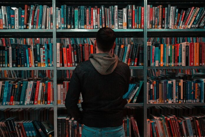 boy in library