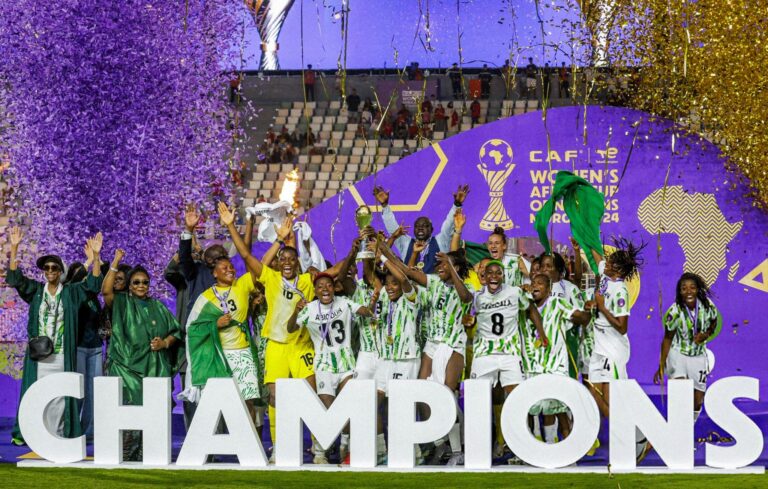 ng victorious women footballers